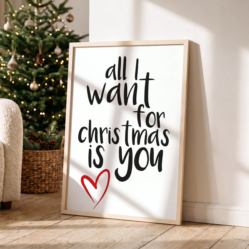 Weihnachtsposter All I Want for Christmas is you im Holzrahmen in einem hellen Wohnzimmer