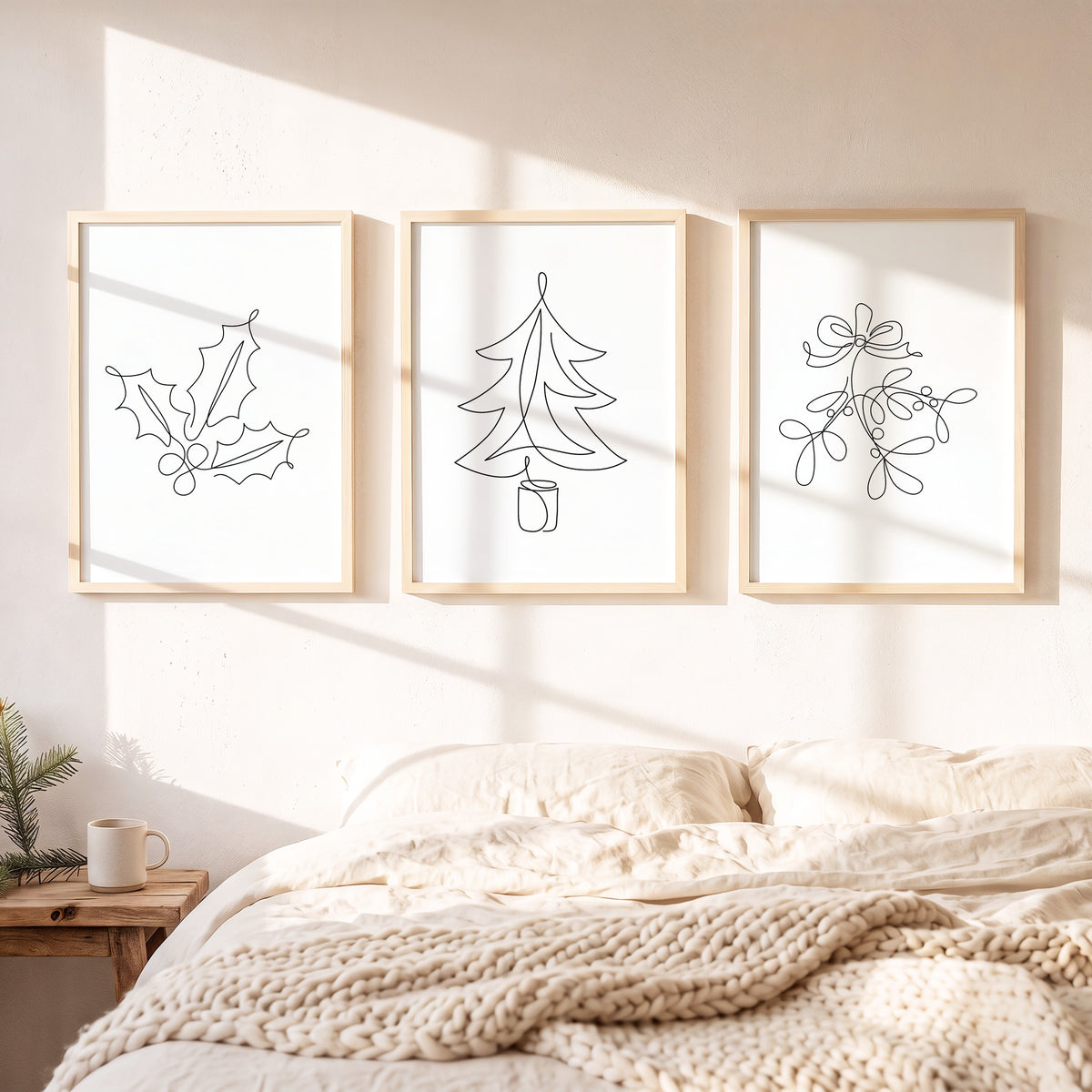 Weihnachtsposter 3er Set One Line gerahmt auf einer Bank