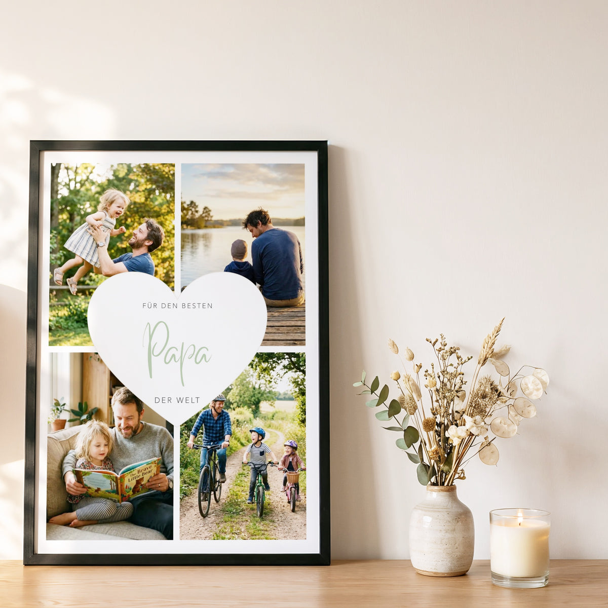 Fotocollage Herz Papa im schwarzen Rahmen auf einem Eichen-Sideboard neben Trockenblumen