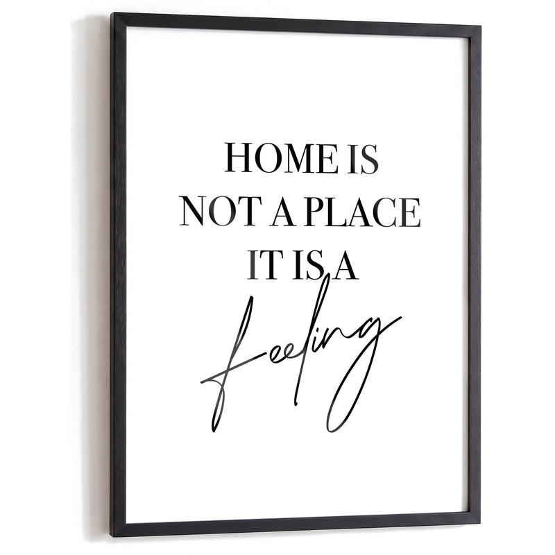 Spruchposter Home is not a place im schwarzen Holzrahmen