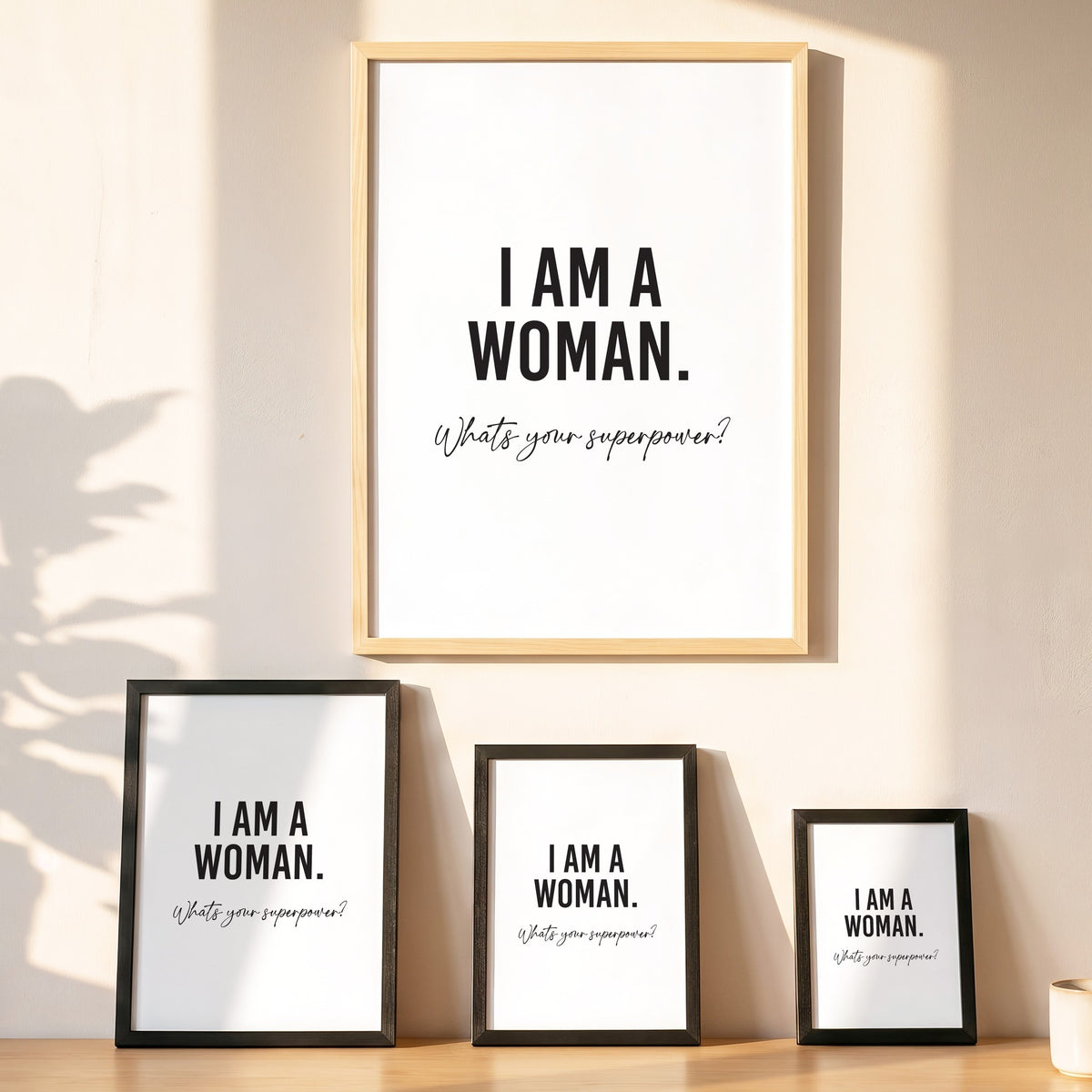 Spruchposter I am a woman in vier Größen an der Wand