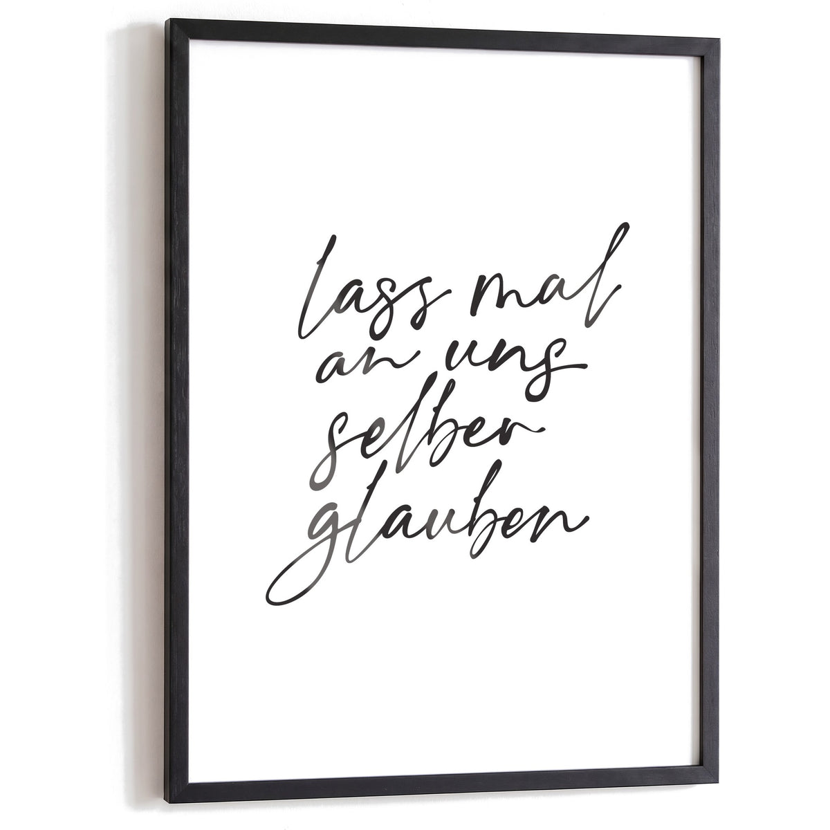 Spruchposter Lass mal an uns selber glauben im schwarzen Holzrahmen