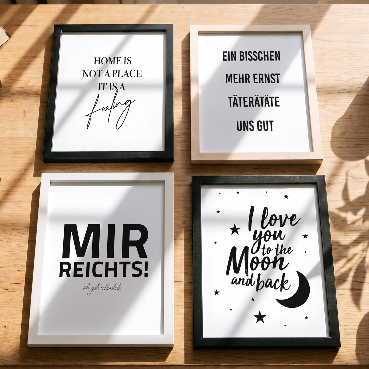 Spruchposter Mir reicht's, ich geh schaukeln mit weiteren Motiven der Reihe auf dem Tisch
