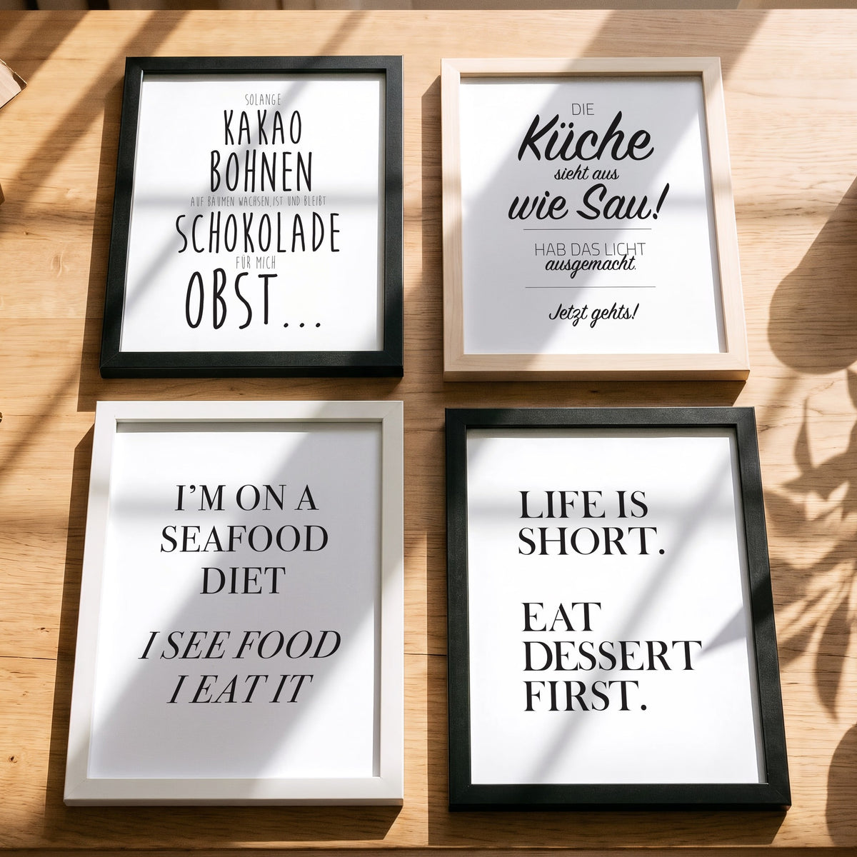 Spruchposter I'm on a seafood diet mit weiteren Motiven der Reihe auf dem Tisch