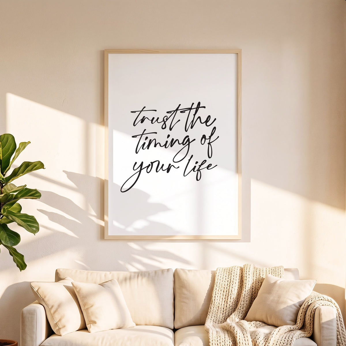 Spruchposter Trust the timing of your life in 50 x 70 cm über dem Sofa