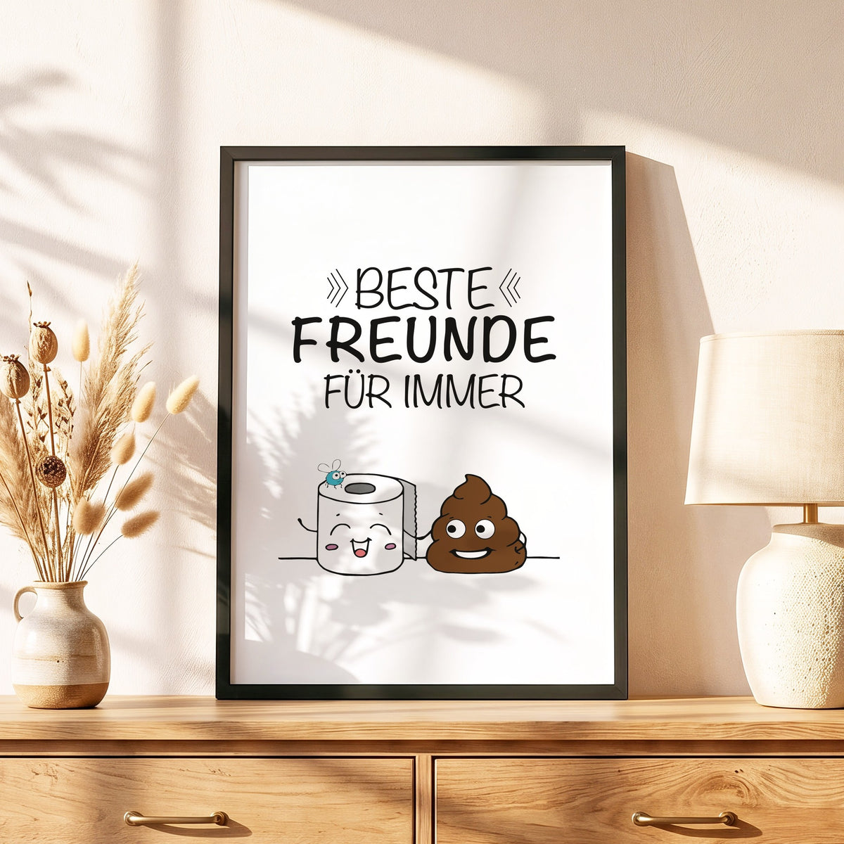 Spruchposter Beste Freunde für immer im schwarzen Holzrahmen auf einer Kommode