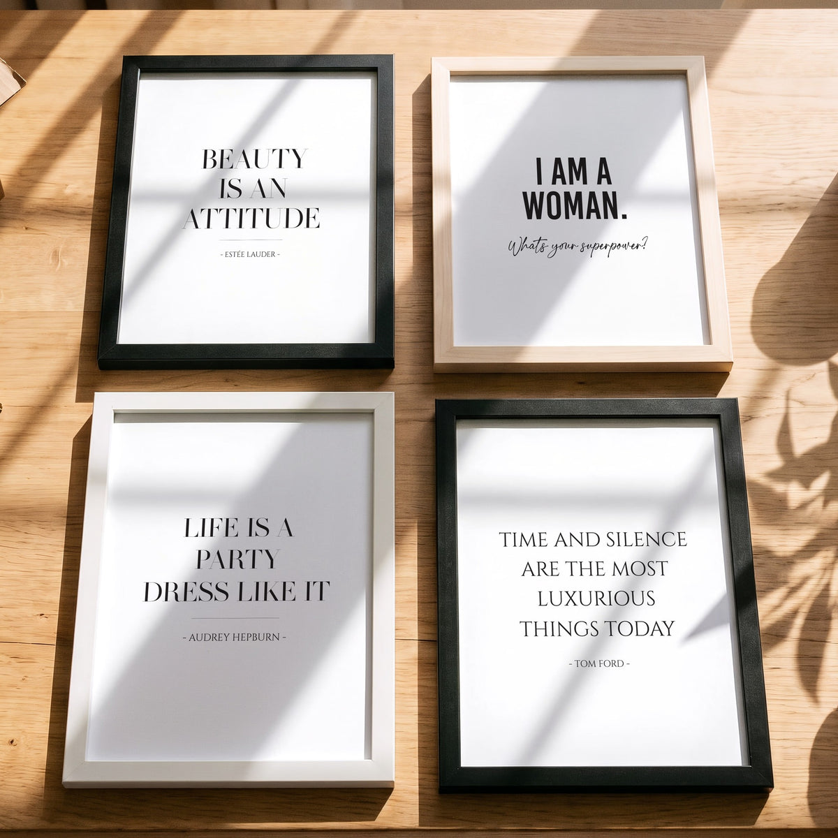 Spruchposter Life is a party, dress like it mit weiteren Motiven der Reihe auf dem Tisch