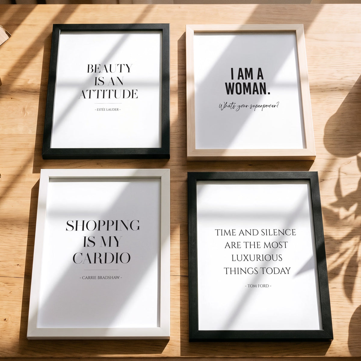 Spruchposter Shopping is my cardio mit weiteren Motiven der Reihe auf dem Tisch