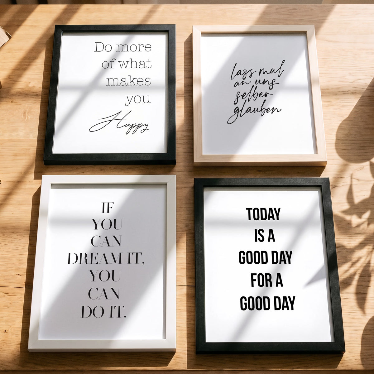 Spruchposter If you can dream it, you can do it mit weiteren Motiven der Reihe auf dem Tisch