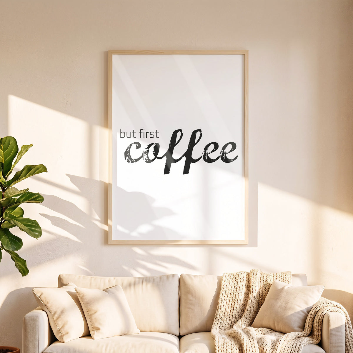 Poster But first coffee in 50 x 70 cm über dem Sofa
